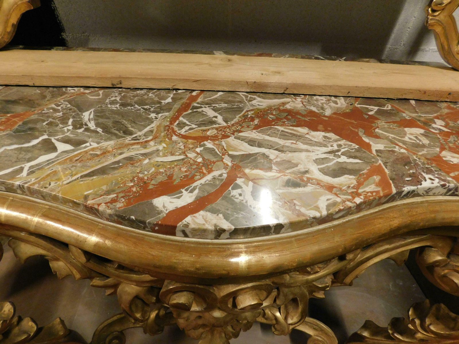 photo for sale Console Mirror In Gilded Wood Carved Floral Decorations, Red Marble Top, Naples