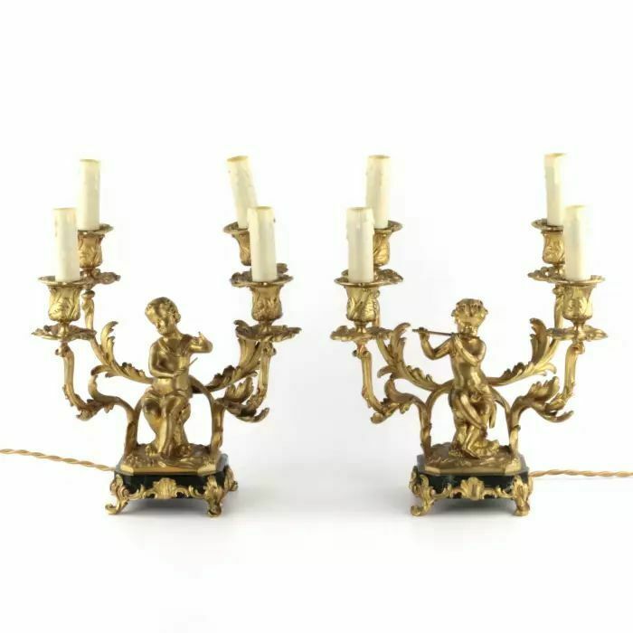 Paired Lamps Of Gilded Bronze With Cupids Playing Music photo furniture