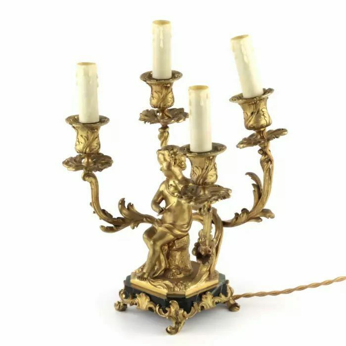 Paired Lamps Of Gilded Bronze With Cupids Playing Music photo 1280.0