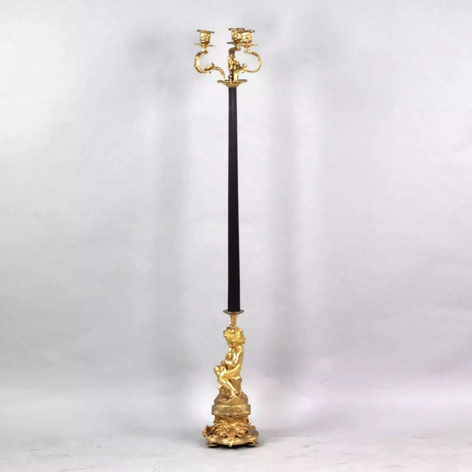 Bronze Floor Lamp With The Figure Of Putti. France. 19th Century. photo for sale