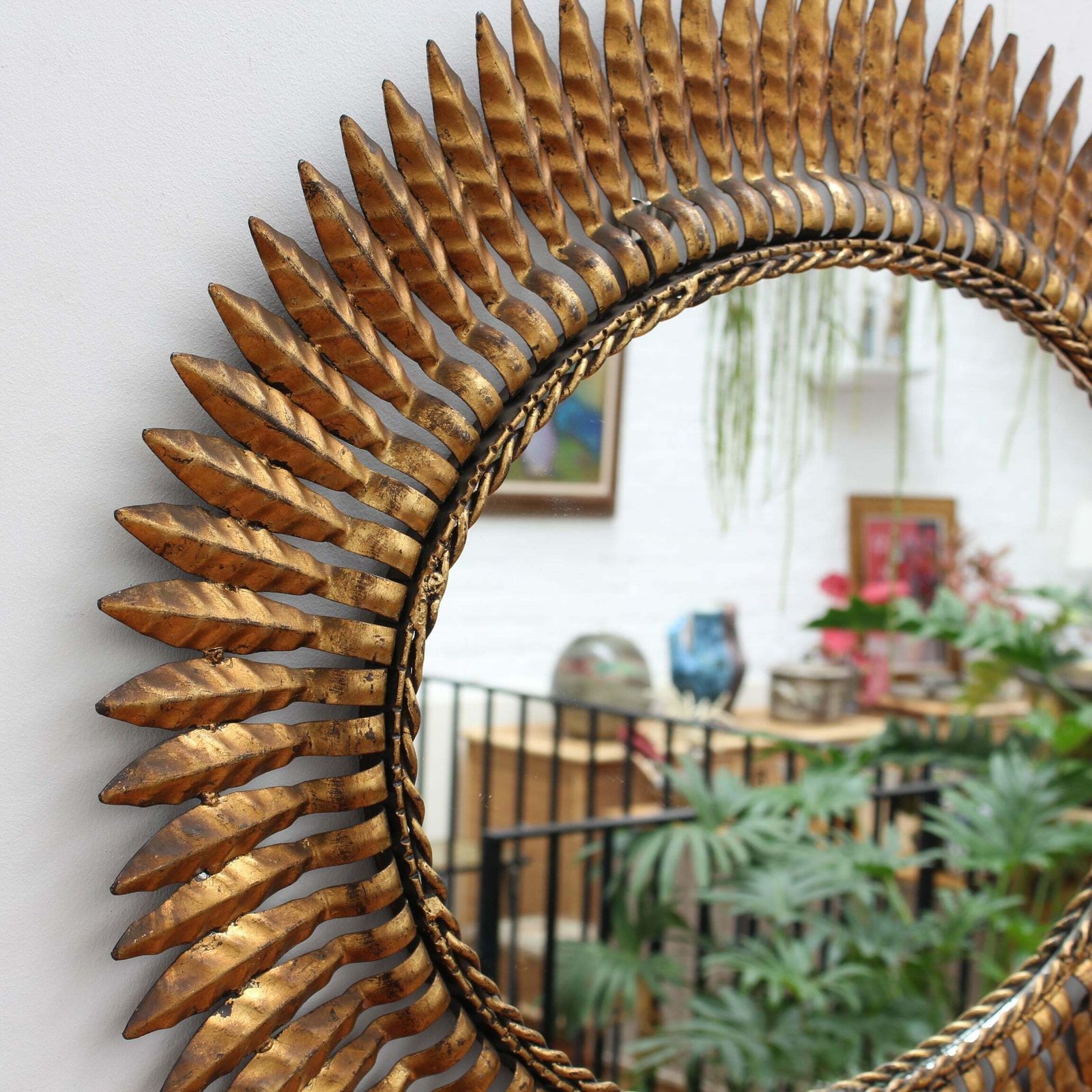 Mid Century Spanish Gilt Metal Sunburst Mirror With Leaf Motif, Circa 1960s. photo for sale