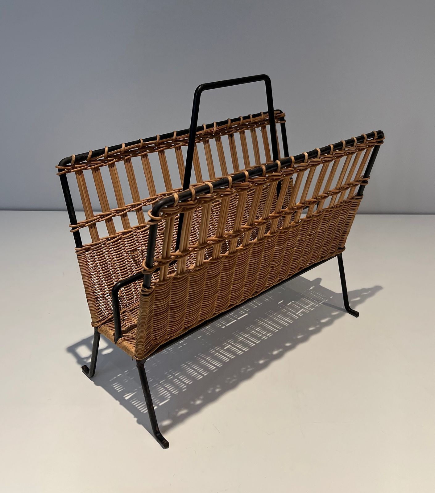 Pair Of Magazine Racks In Black Lacquered Metal And Rattan photo vinterior
