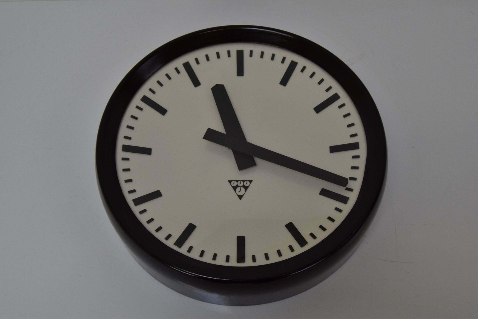 Bakelite Industrial Wall Clock By Pragotron, 1960's. photo furniture