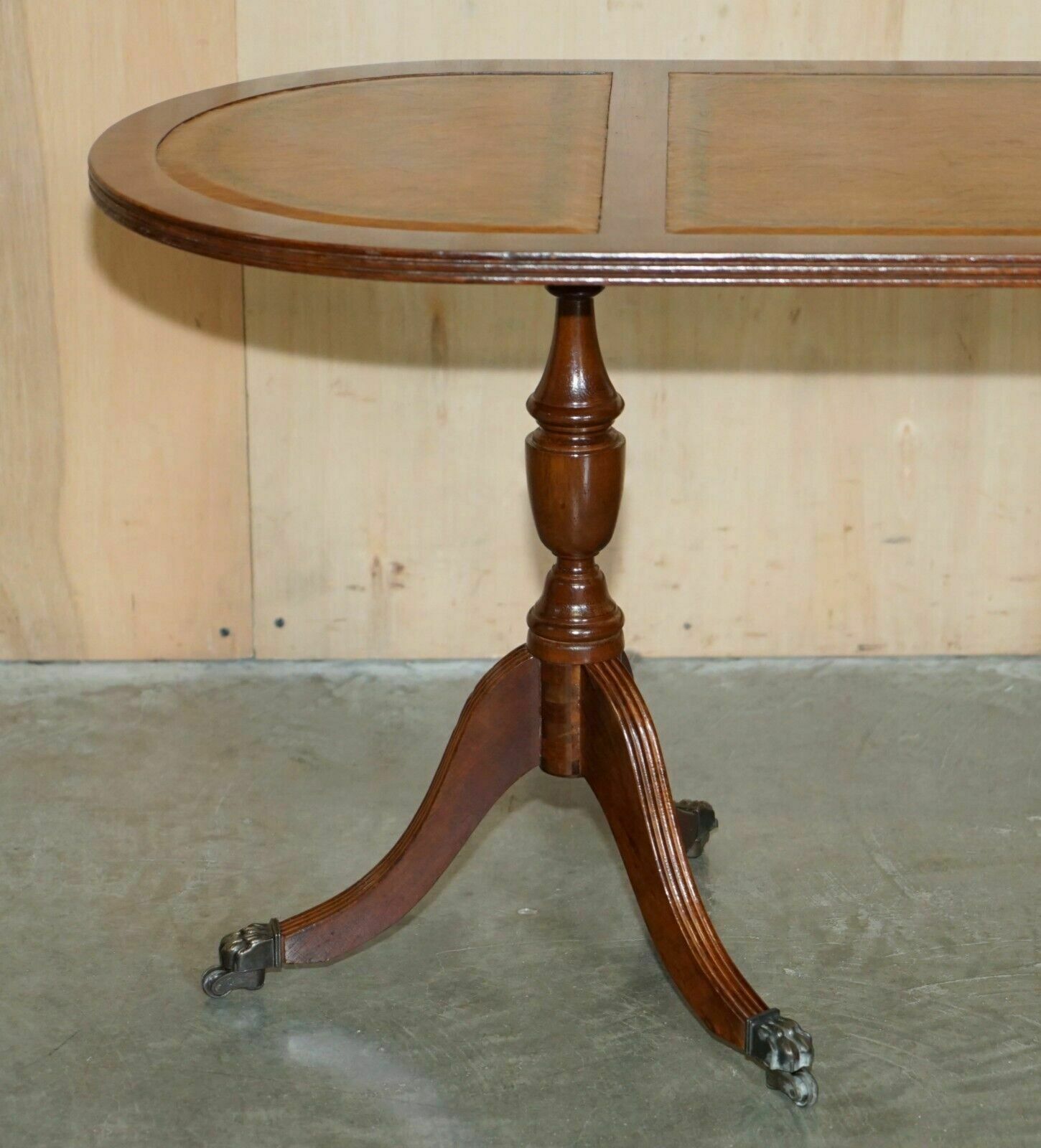 Vintage Hand Dyed And Aged Brown Leather Oval Coffee Table With Lion Castors photo Furniture