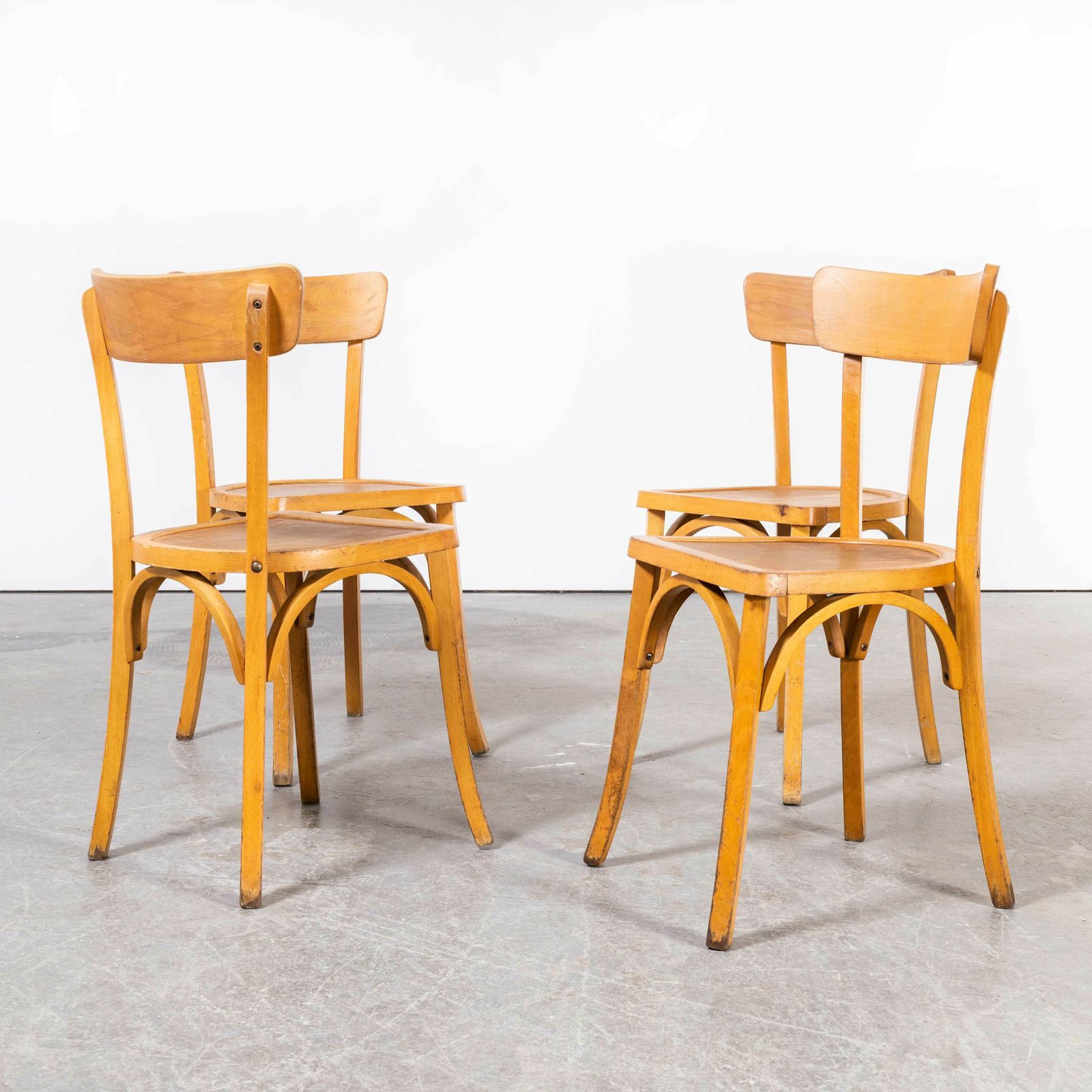 1950’s French Baumann Blonde Kick Leg Bentwood Dining Chairs – Set Of Four photo for sale