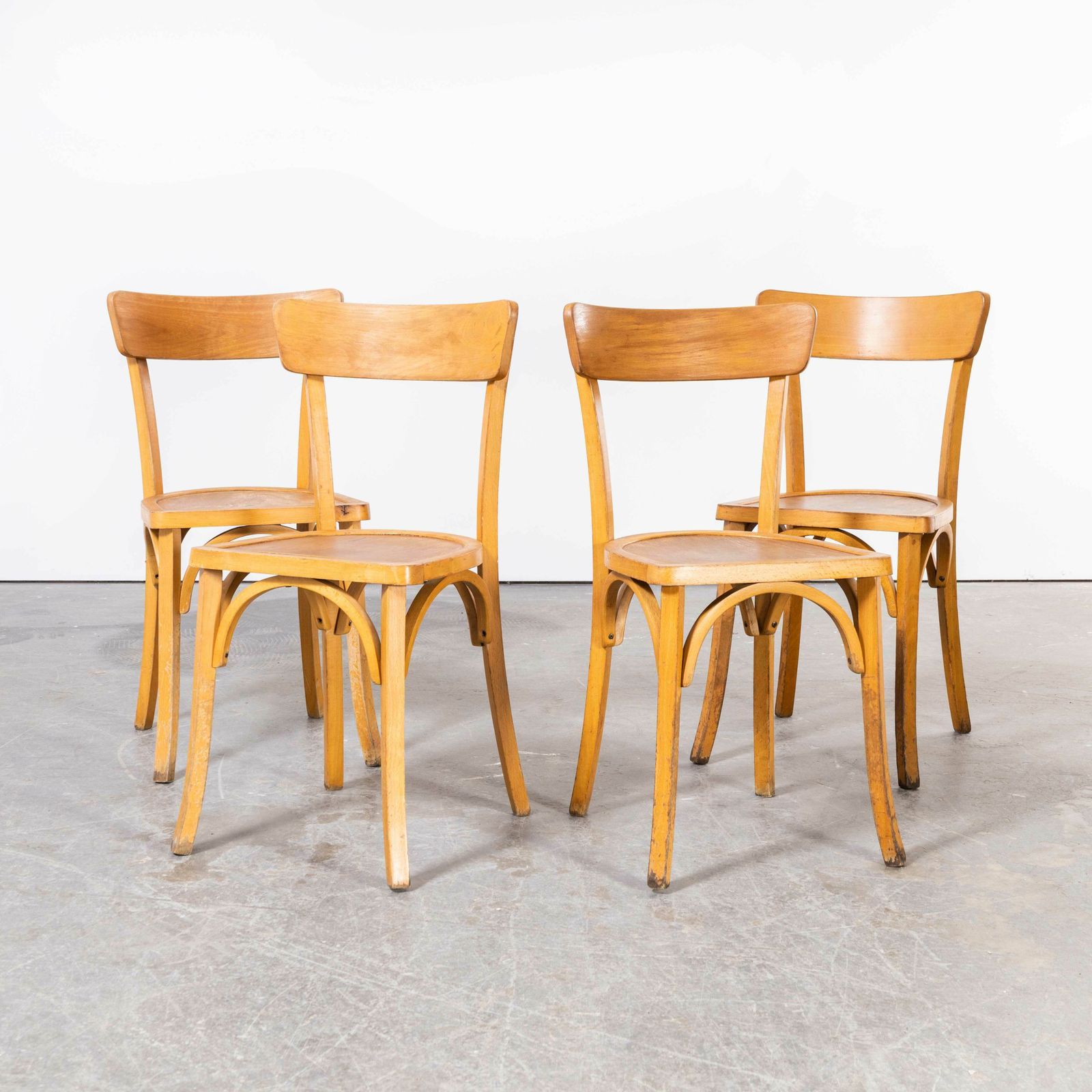 1950’s French Baumann Blonde Kick Leg Bentwood Dining Chairs – Set Of Four photo 600.0