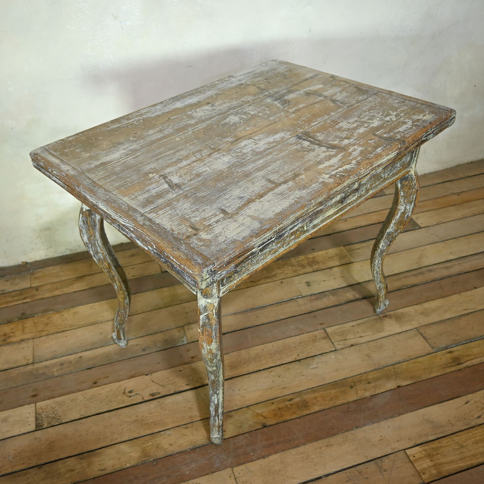 photo buy A 19th Century French Painted Swivel Top Dining Table
