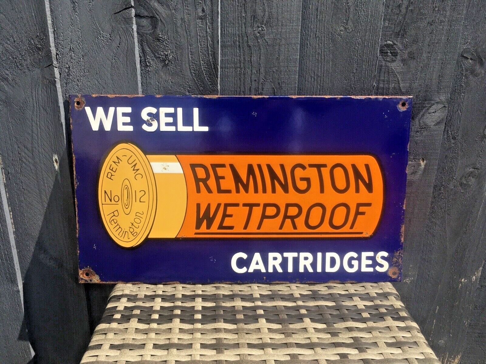 We Sell Remington Wetproof Cartridges Metal Enamel Shotgun Ammo Sign Man Cave photo vintage