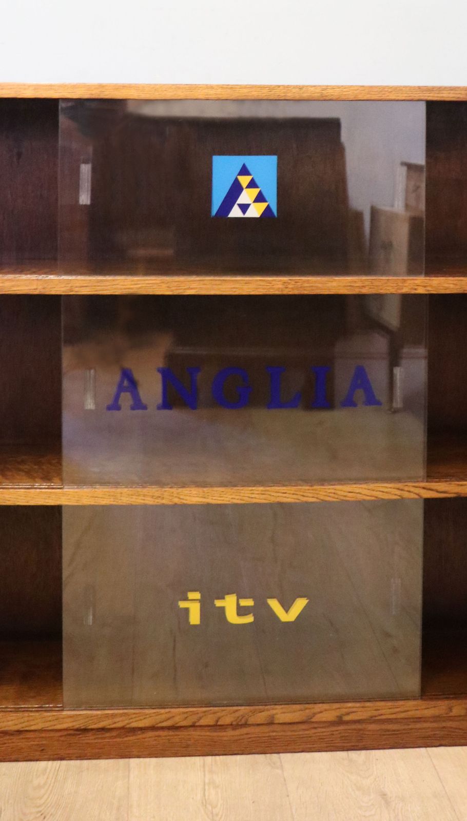 photo vinterior A Lovely Retro Mid Century Display Cabinet Later Sign Written For Anglia Television.
