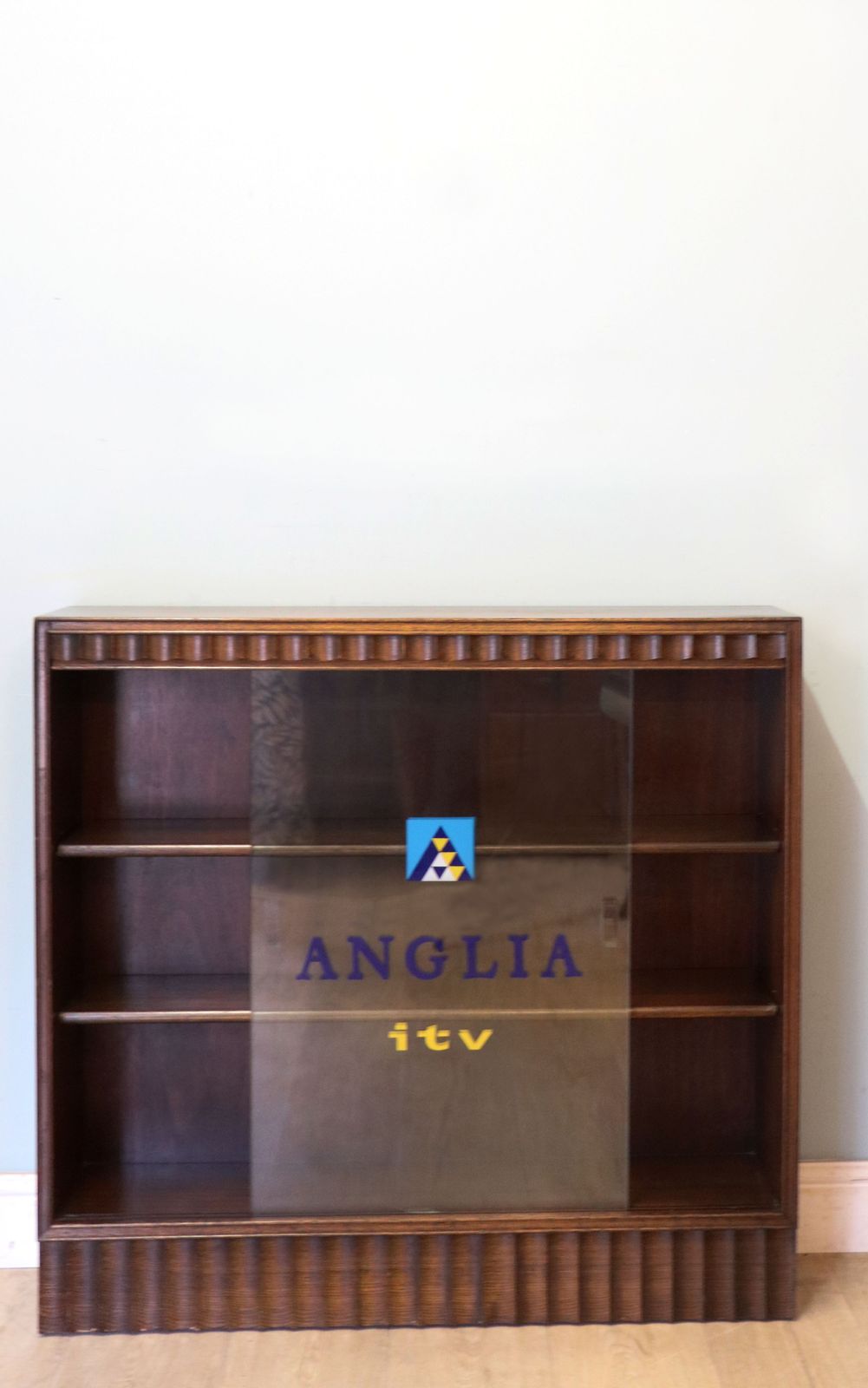 This Lovely Retro Display Cabinet Later Hand Sign Written For Anglia Television. photo Furniture