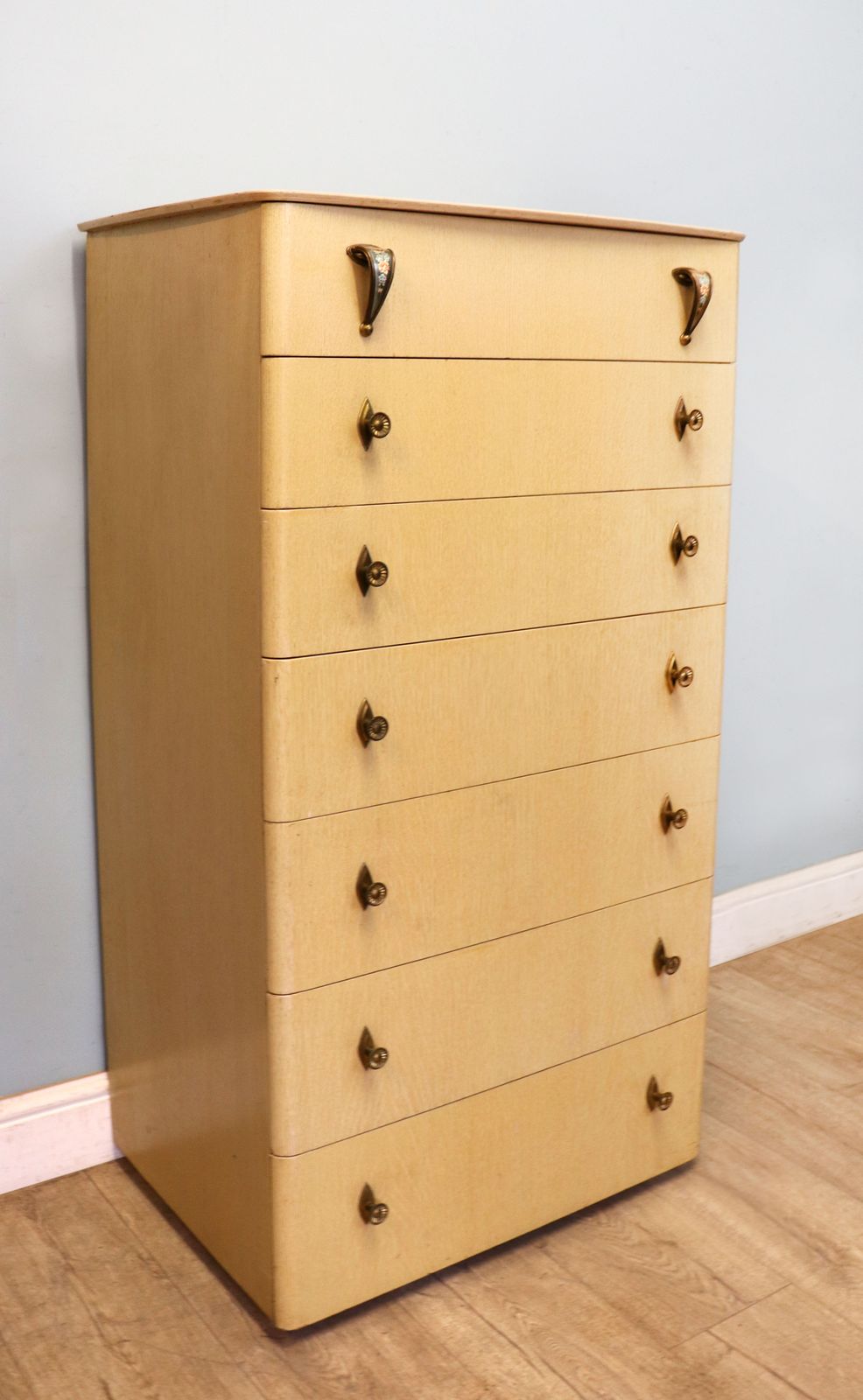 A Lovely Mid Century Blond Oak Veneered Chest Of Seven Drawers. photo for sale