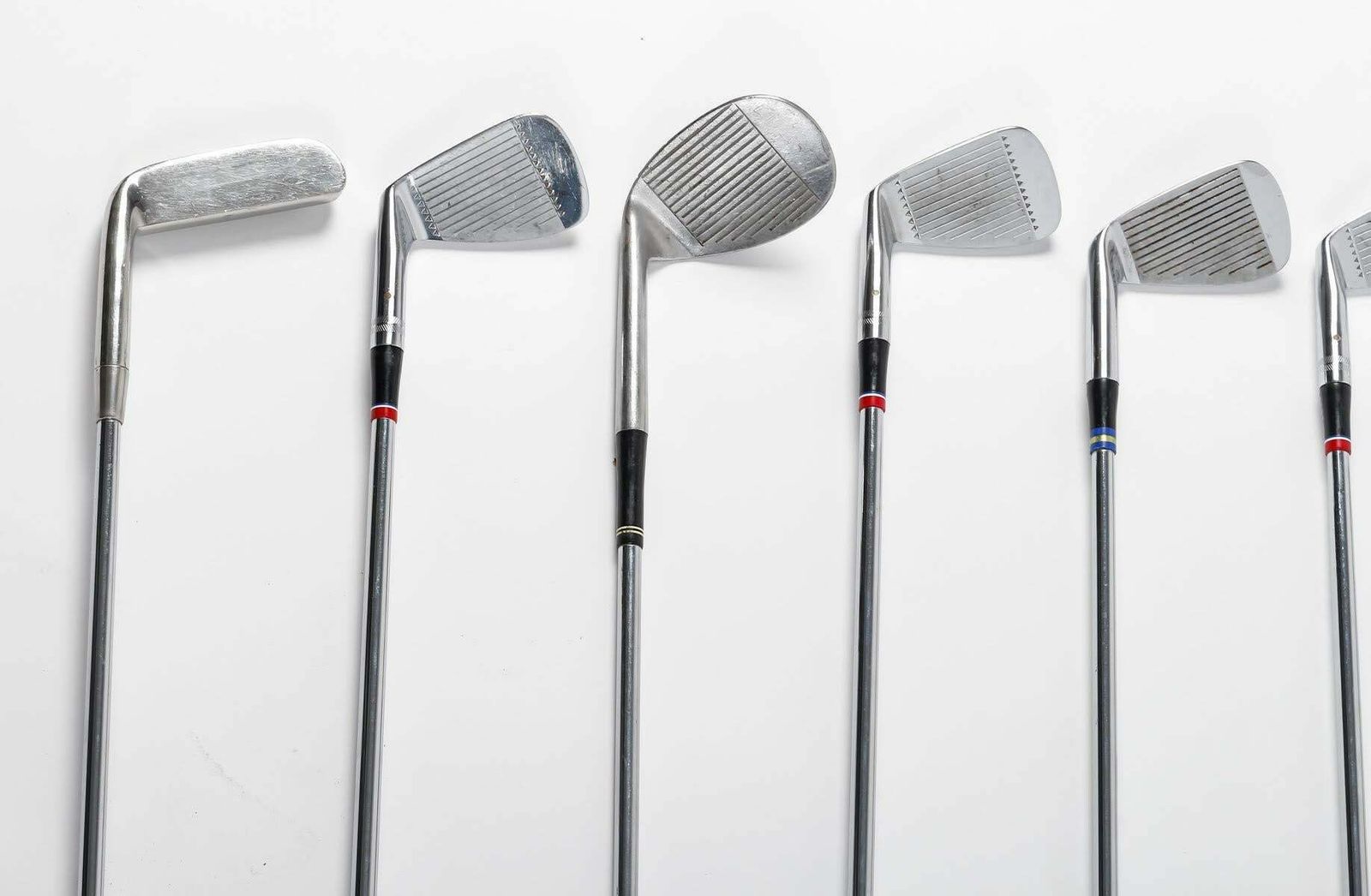 photo for sale Suite Of 9 Golf Clubs From The 1960s.