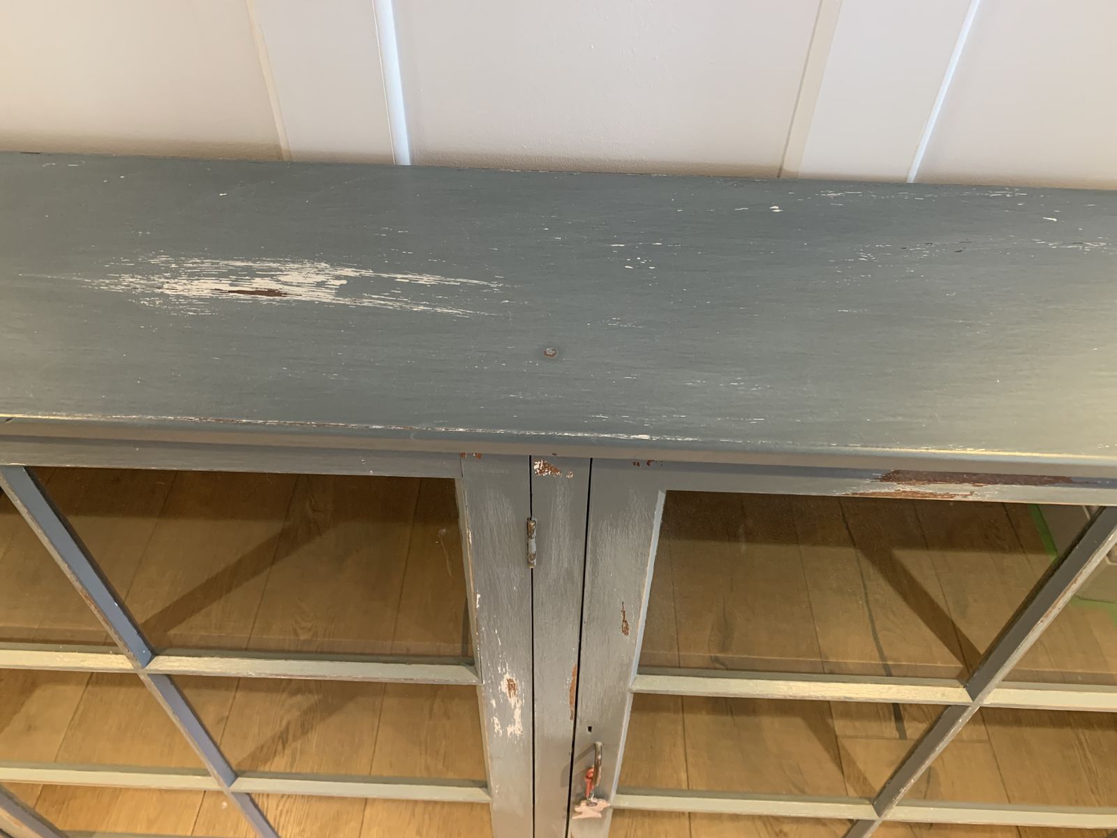 photo vintage Vintage Wooden Display Cabinet Painted In A Distressed Look Using Farrow And Ball Incyra Blue. Decorative Farrow And Ball Paper To The Rear Internal Walls Using Double Sided Tape Which Can Easily Be Removed