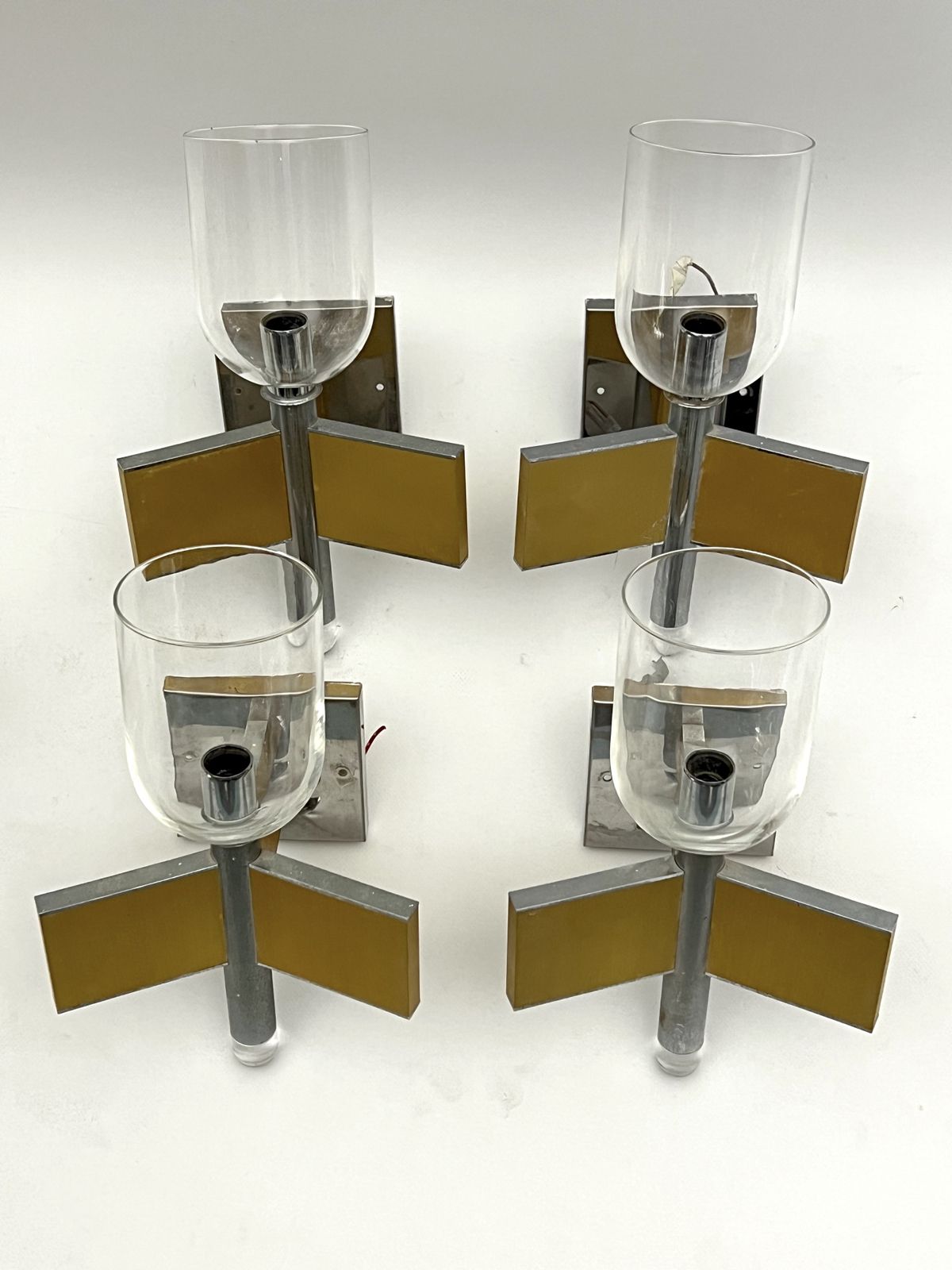 photo furniture Mid Century Modern Set Of Eight Brass And Chrome Sconces By Sciolari. Italy 1970s