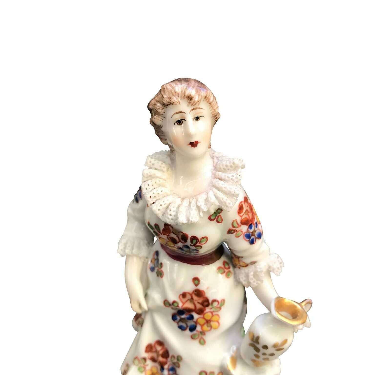 Porcelain Figurine Of A Woman, 1900s photo for sale