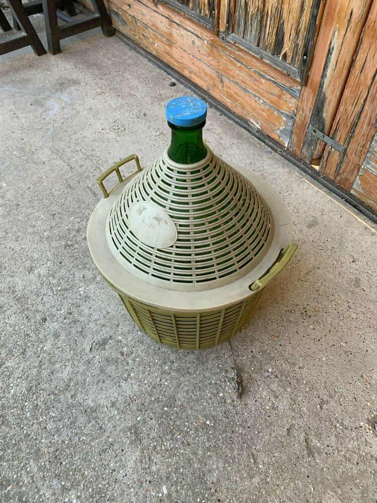 Mid Century Glass Demijohn In Plastic Basket photo furniture