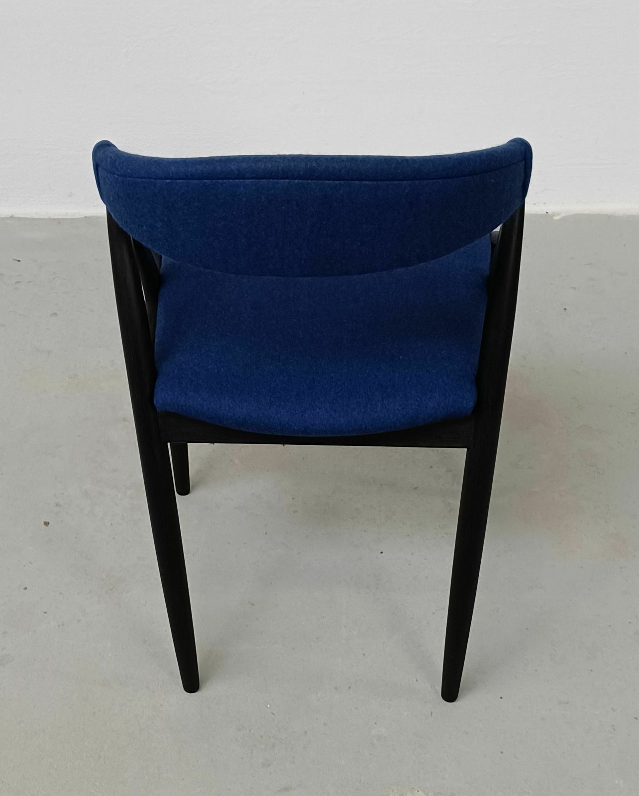 photo furniture Set Of Eight Fully Restored Kai Kristiansen Dining Chairs In Ebonized Oak And Blue Fabric