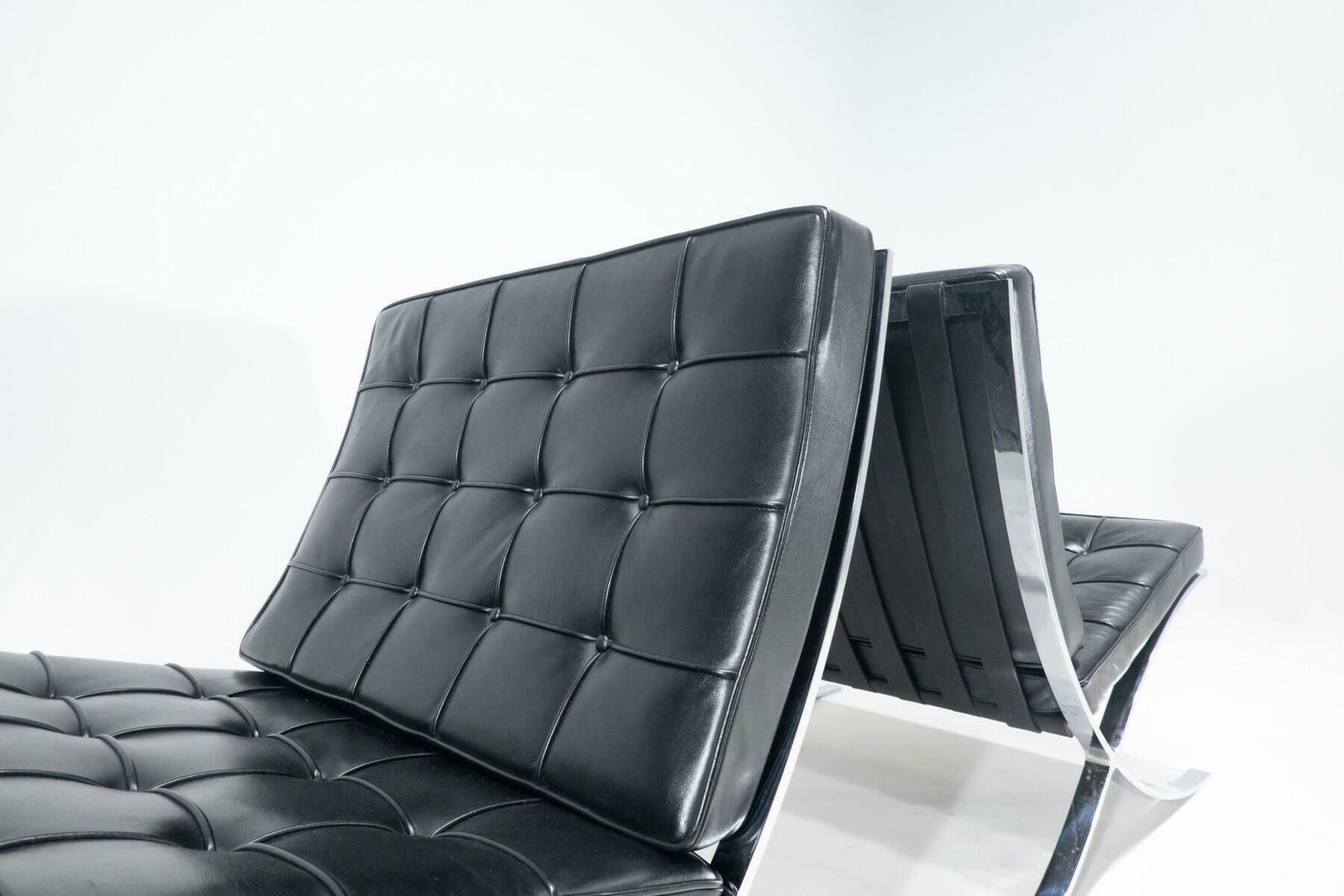Pair Of Black Leather Barcelona Chairs By Mies Van Der Rohe For Knoll, 1960s photo vintage