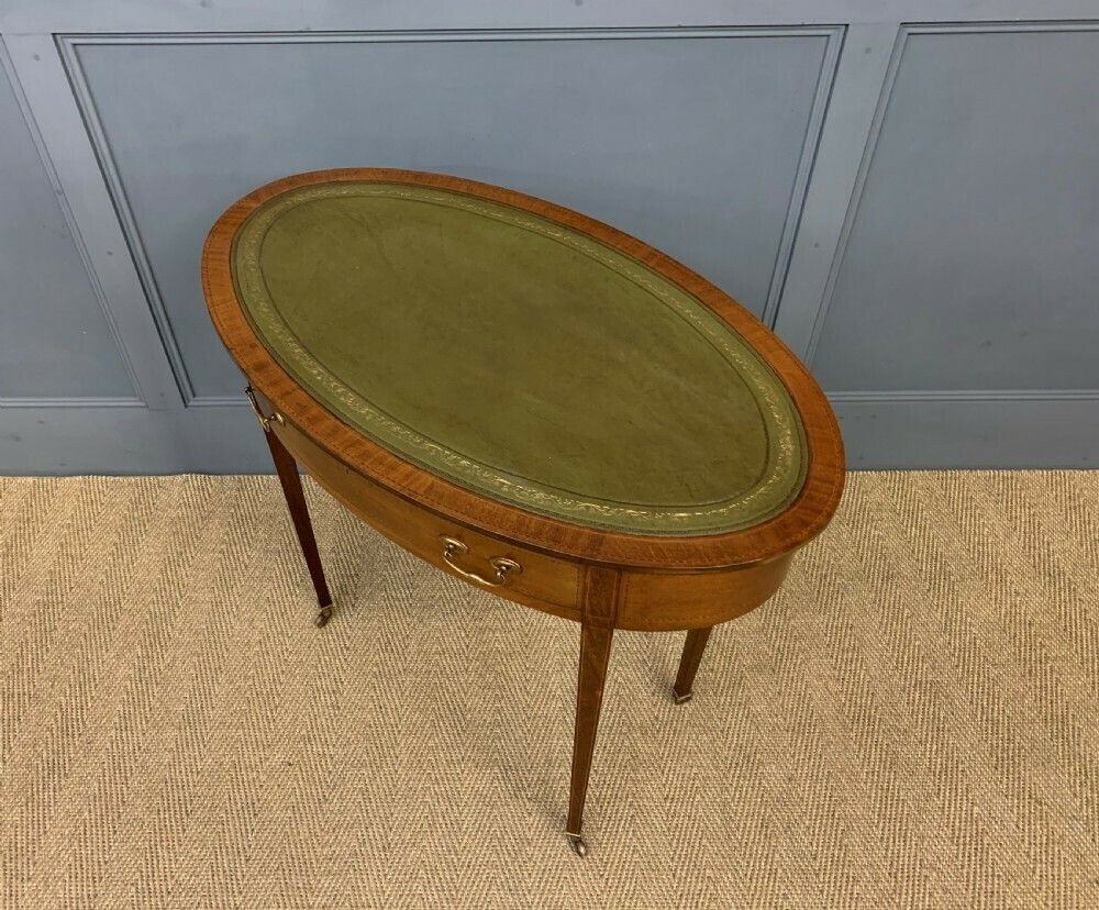 715.0 Edwardian Oval Inlaid Mahogany Writing Table photo