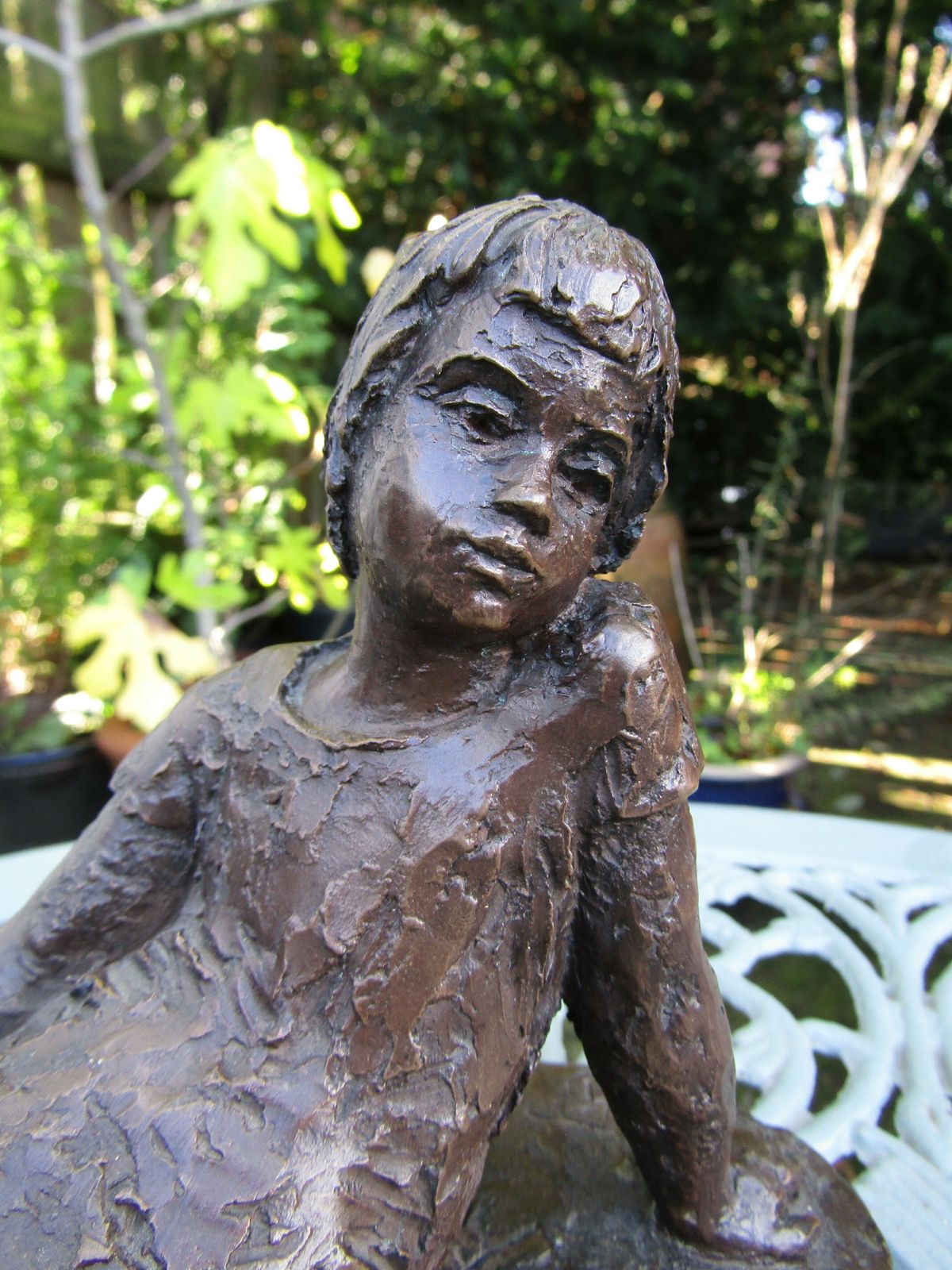 Bronzed Figure Of Girl Seated, Signed Kj For Kari Juva photo for sale