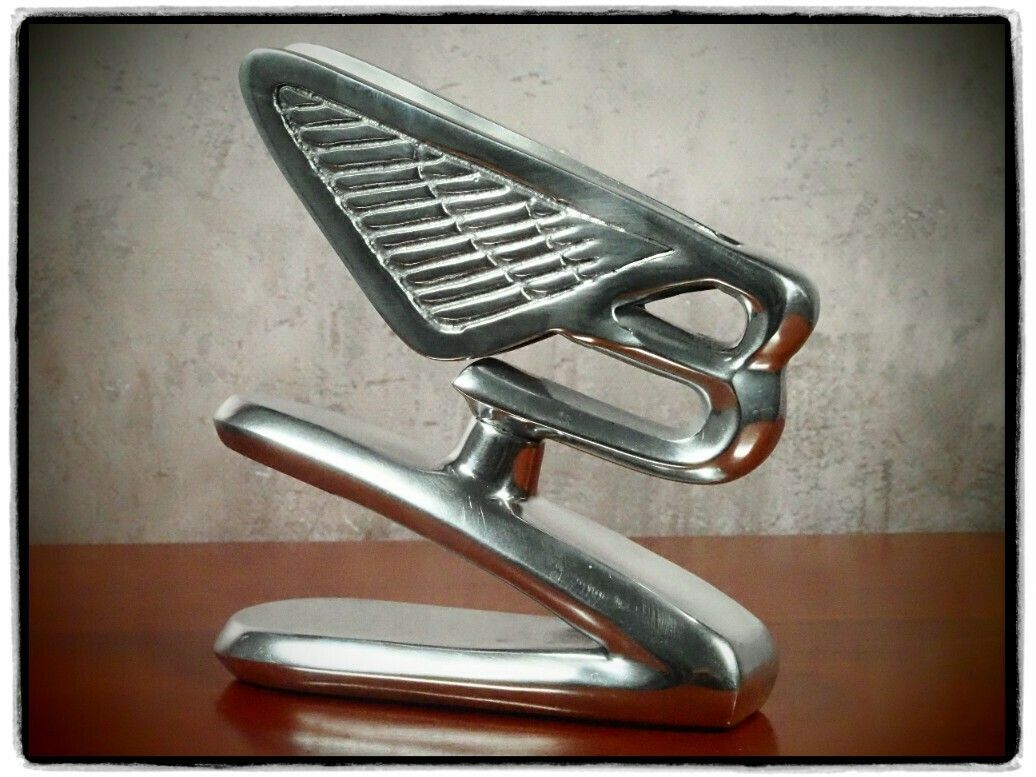 Bentley 1980 Decorative Art Sculpture – Polished Aluminum With Felt Base photo furniture