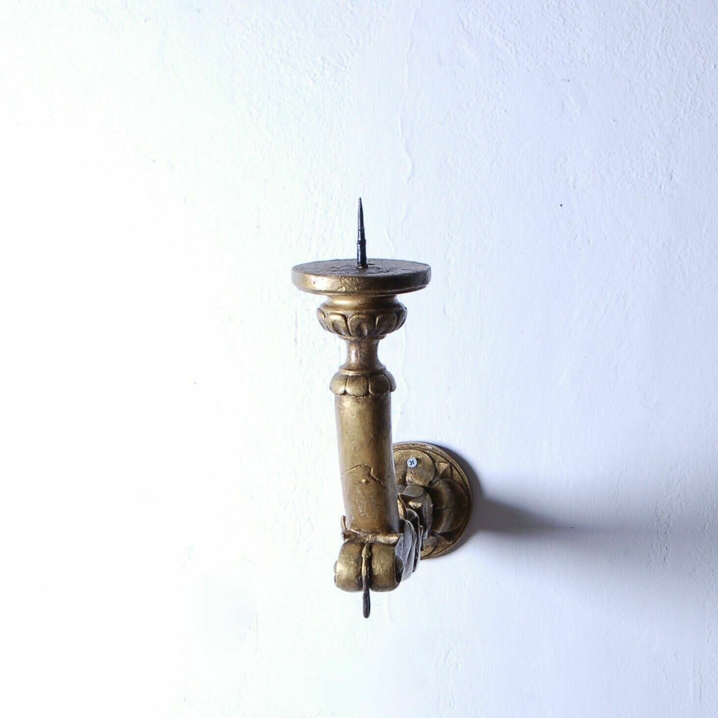 Old Wall Candle Holder From The 19th Century With An Ecclesiastical Gilded Wooden Arm photo vintage