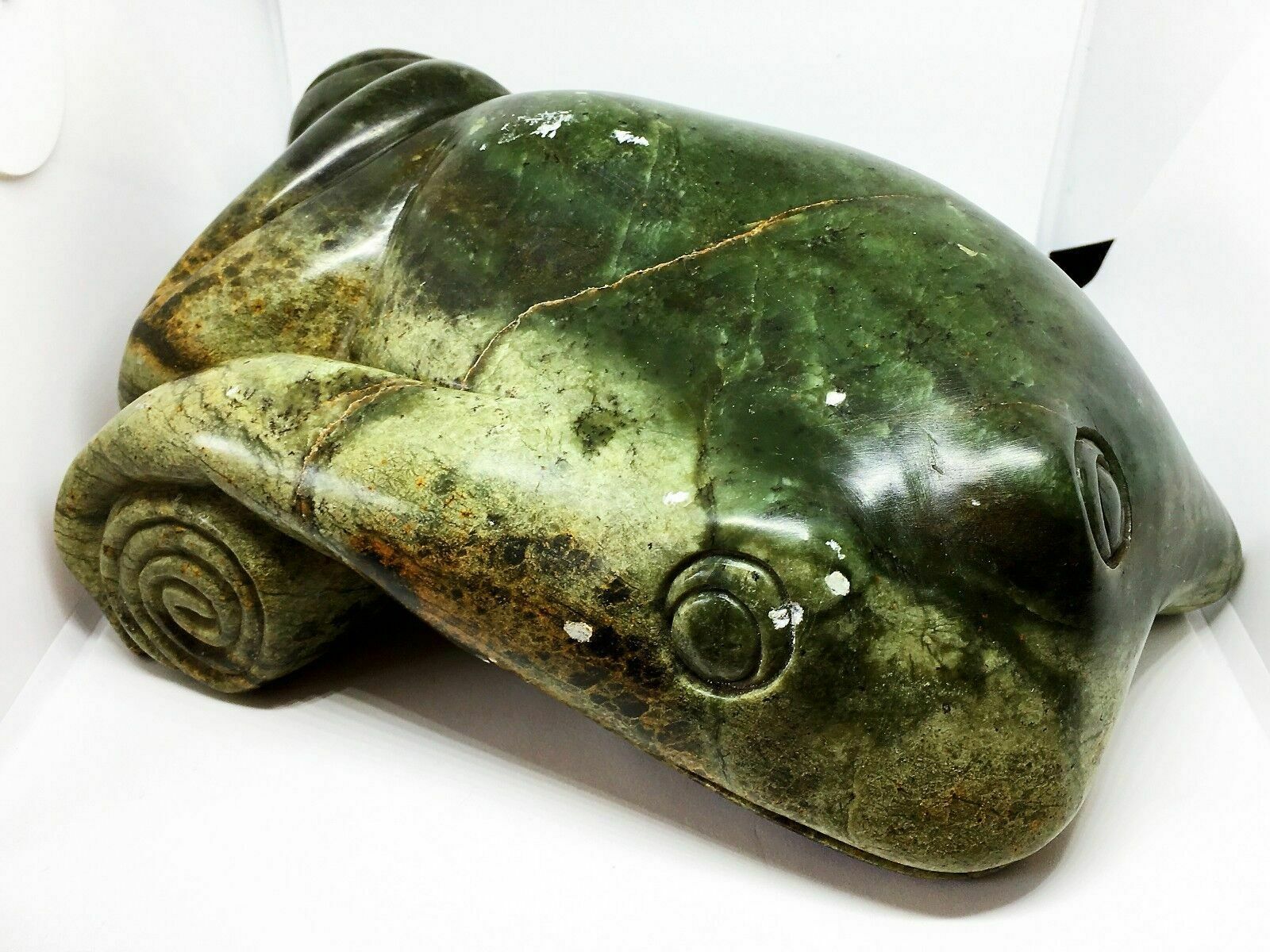 Jade(tough, Green Mineral Either Jadeite Or Nephrite Amphibole)frog With A Book photo vintage
