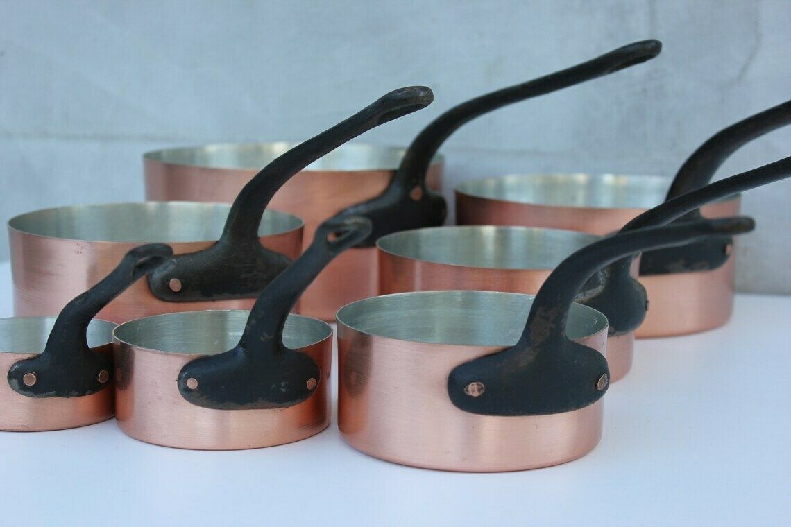 Vintage Copper Pans, Set Of Seven Saucepans With Metal Handles, Rustic Kitchen Utensils And Decoration photo for sale