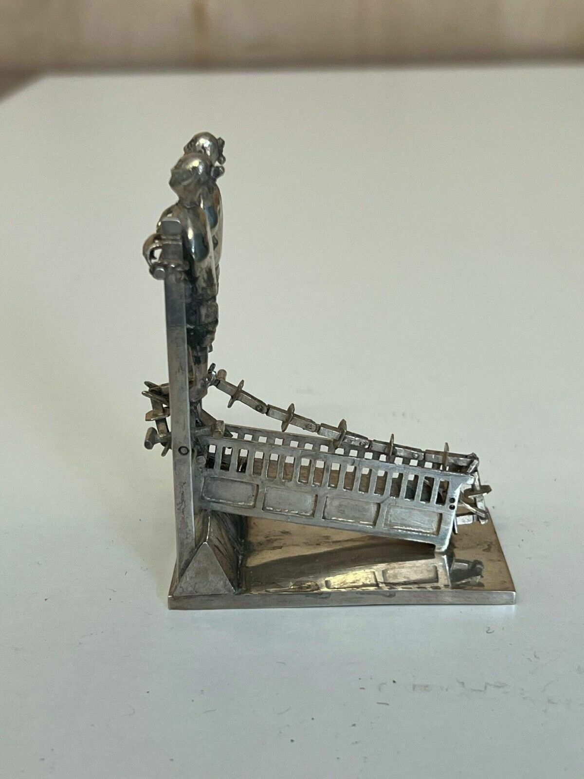 photo buy Antique Circa 1890 Chinese Sterling Silver Statue Of Men Peddling With A Chain