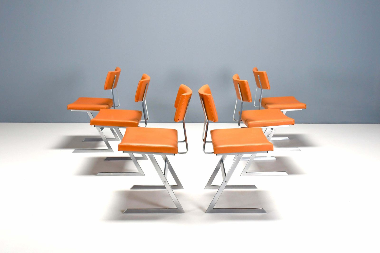 Set Of Six ‘Zig Zag’ Chairs In Metal And Orange Leatherette, Belgium 1960s photo vinterior