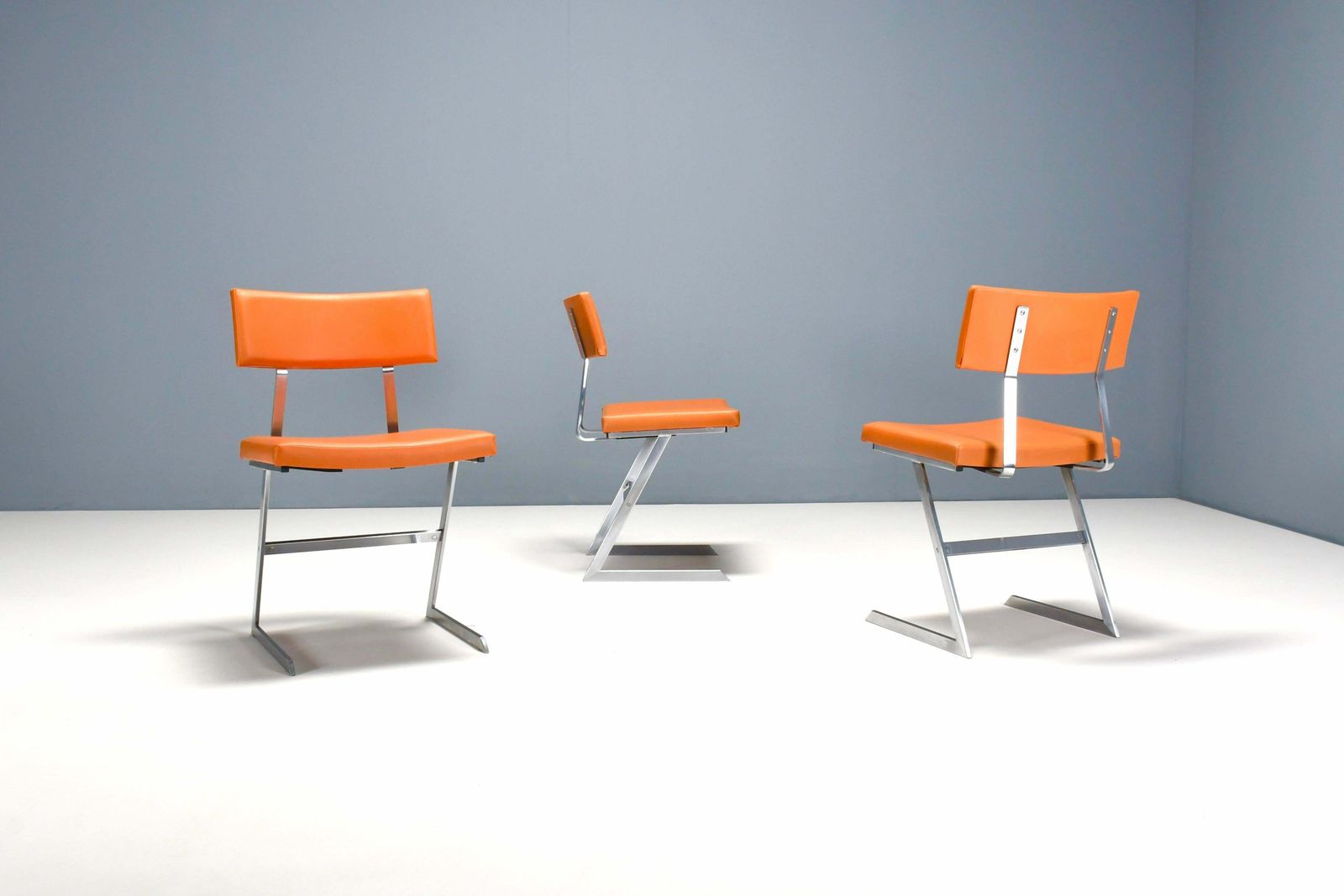 Set Of Six ‘Zig Zag’ Chairs In Metal And Orange Leatherette, Belgium 1960s photo buy
