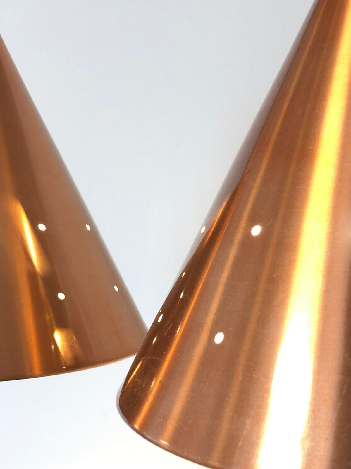 Pair Of Gorgeous Vintage Design Ceiling Lamps From Denmark With Shades In Warm Copper Coloured Aluminium With Perforated Holes photo Lighting