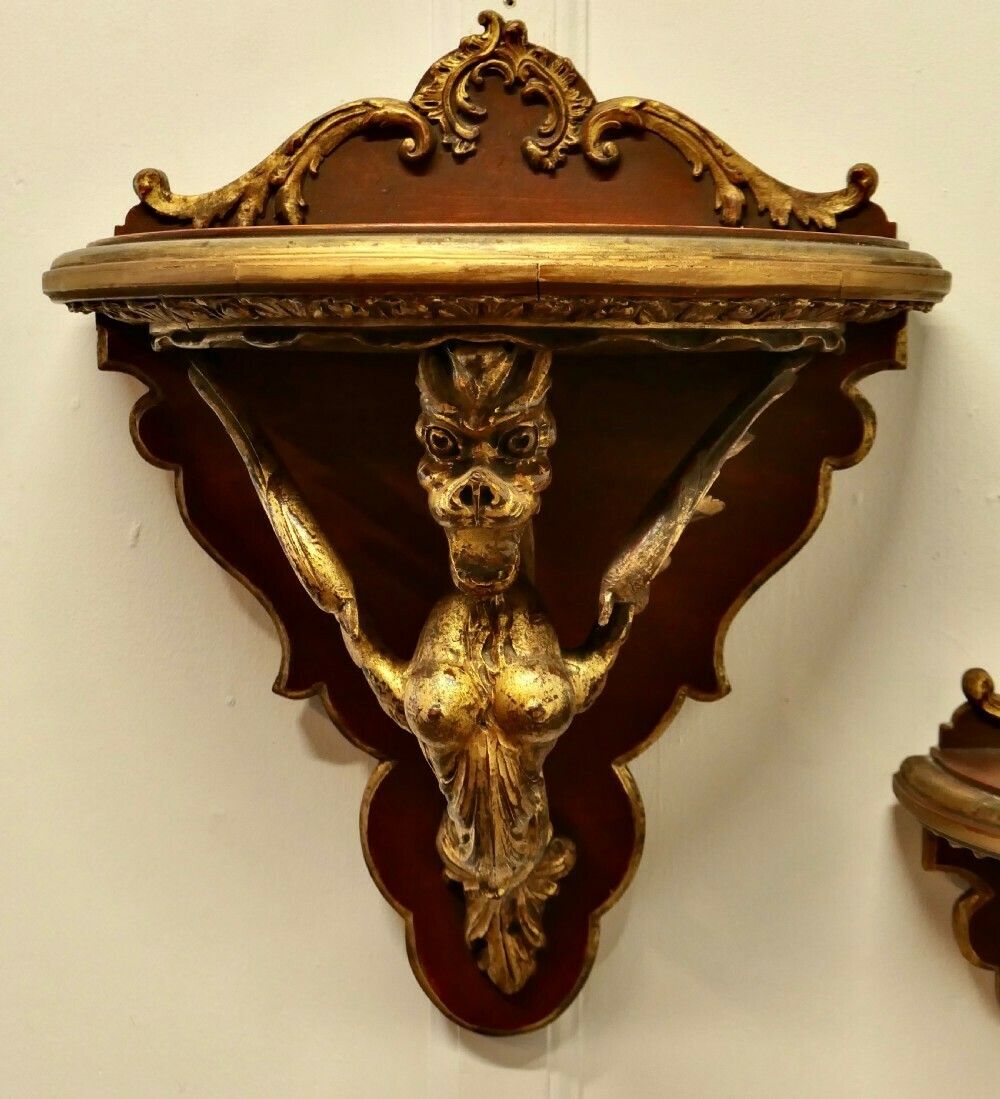 A Large Pair Of Italian Carved Gilt Wall Brackets photo furniture