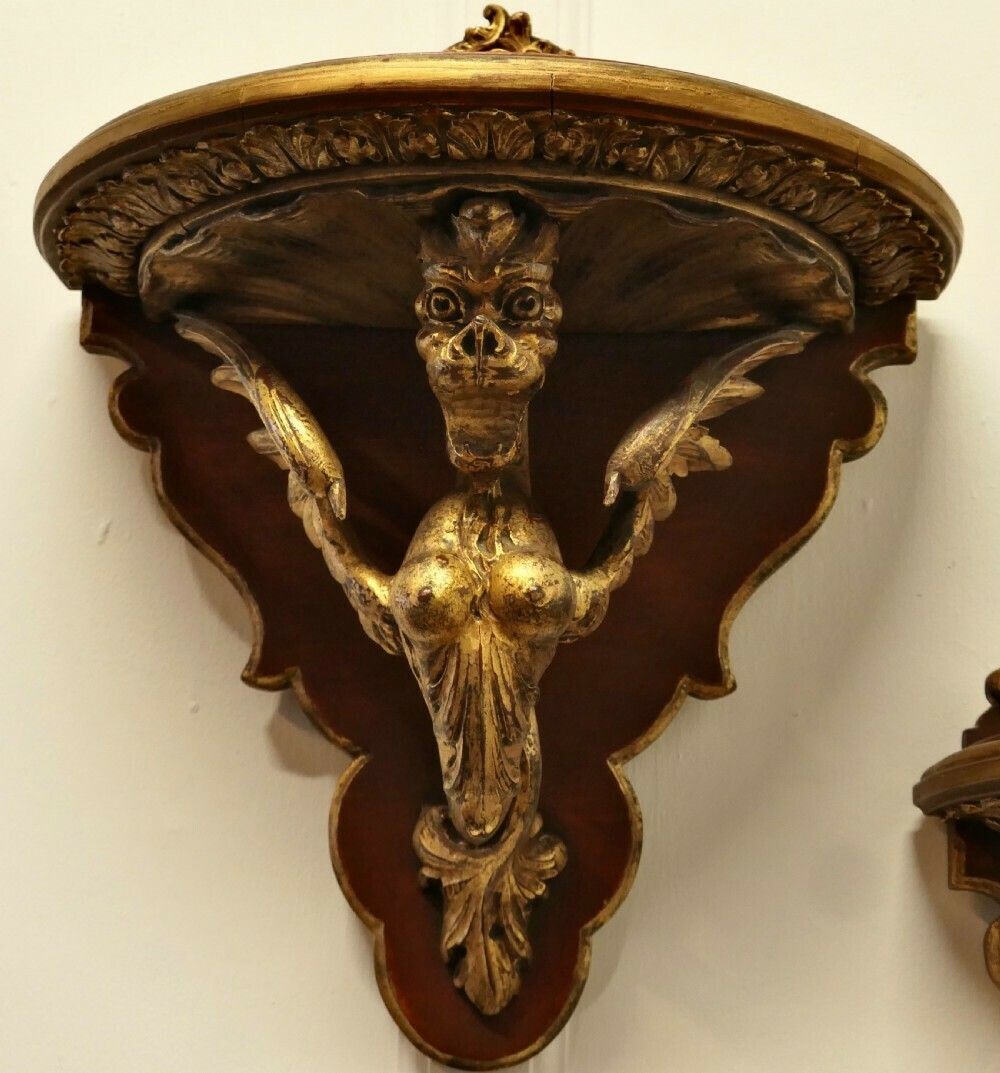A Large Pair Of Italian Carved Gilt Wall Brackets photo for sale
