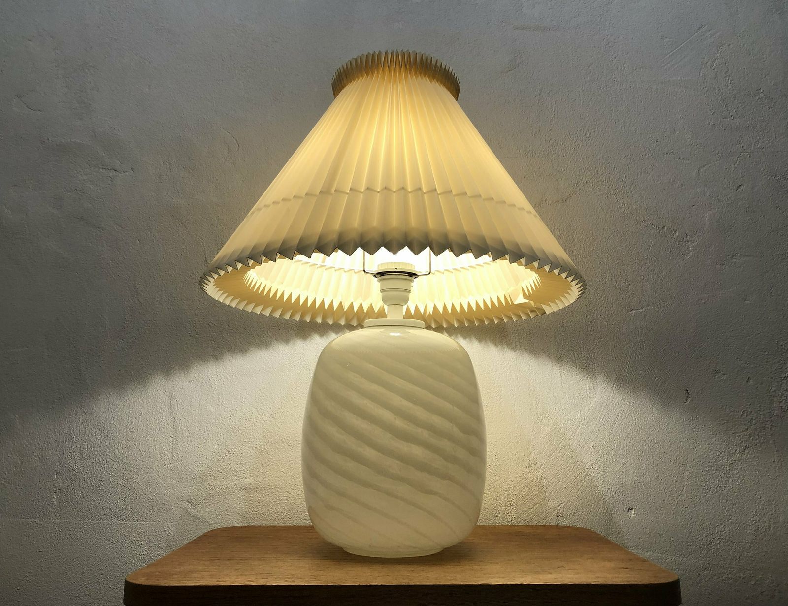 Danish Mid Century Modern Huge Table Lamp In Striped Patterned Minimalistic Art Glass With A Large Beige Pleated Le Klint Shade photo for sale