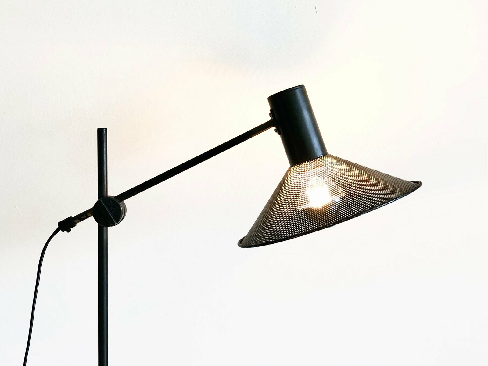 Original Mid Century Modern Danish Floor Lamp In Perforated Metal With Black Paint And Adjustable Shade
