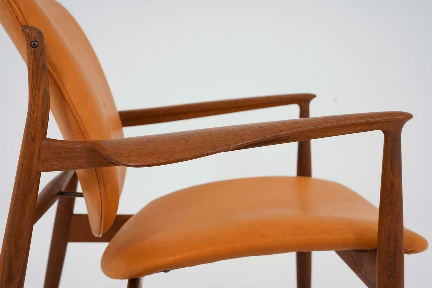 Finn Juhl Cognac Leather And Teak Lounge Chair Model Fd 136 photo vinterior