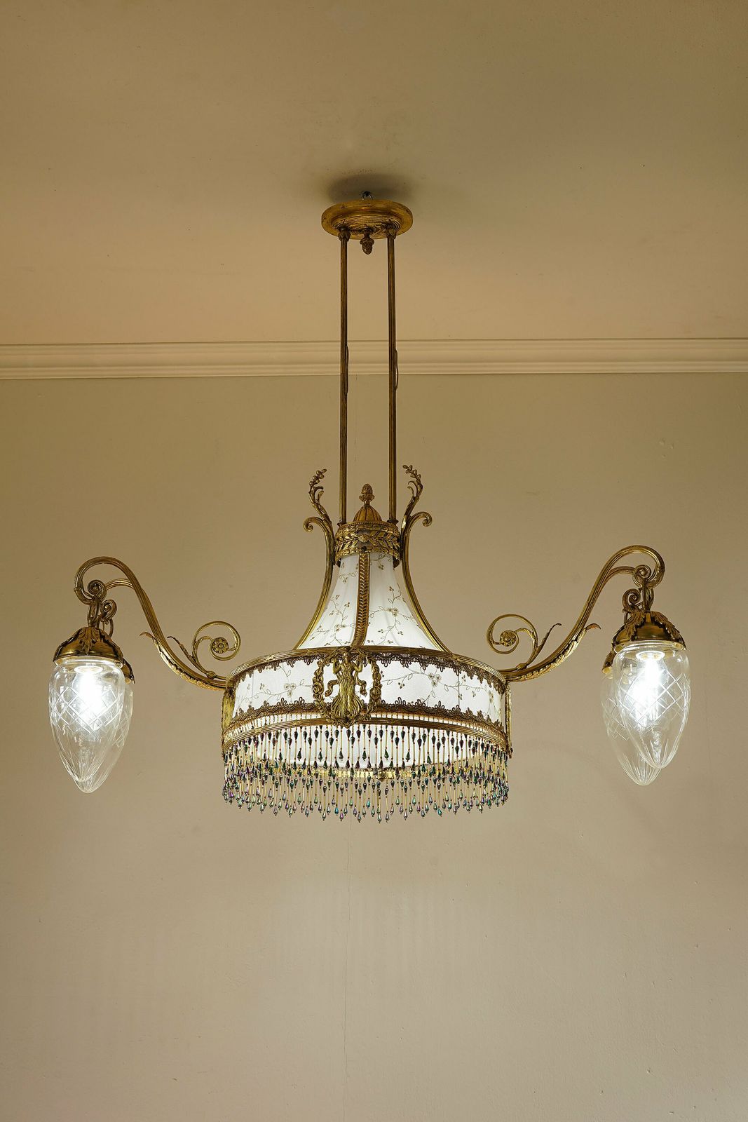photo furniture Art Nouveau Brass Chandelier, With A White And Gold Tulle Fabric Lampshade