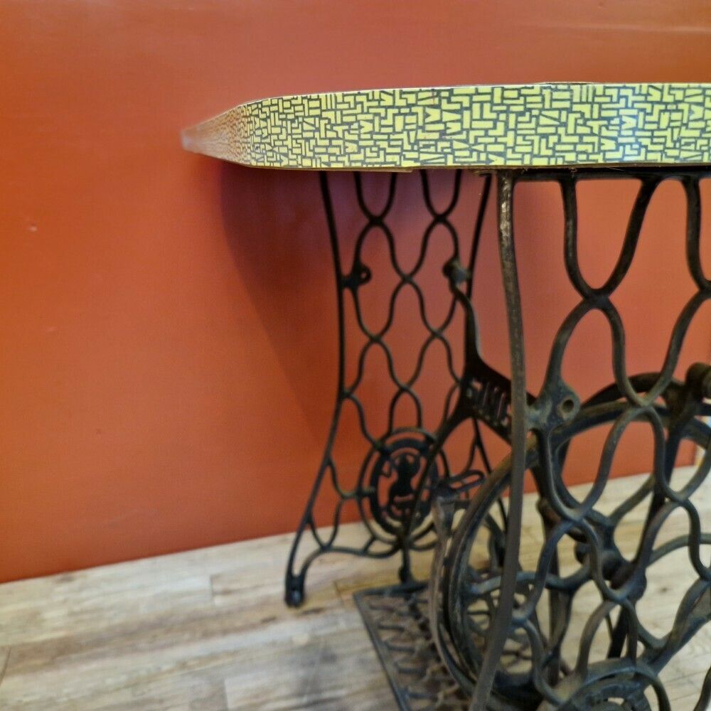 Yellow 1960's Table With Sewing Machine Base photo furniture