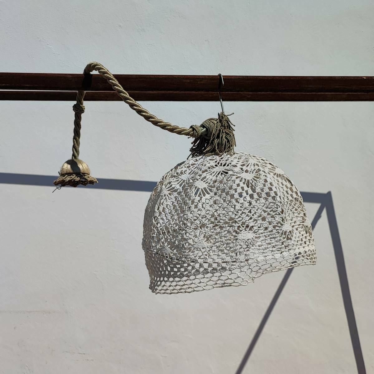 Metal Cage Chandelier And Vintage Embroidery