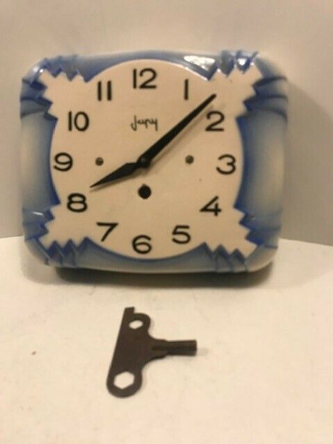 An Art Deco French Wall Clock By Japy Freres Ceramic Surround