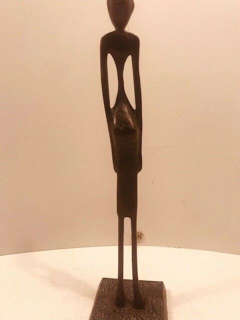 A Metal Statuette Of An African Woman In The Style Of Alberto Giacometti photo vinterior