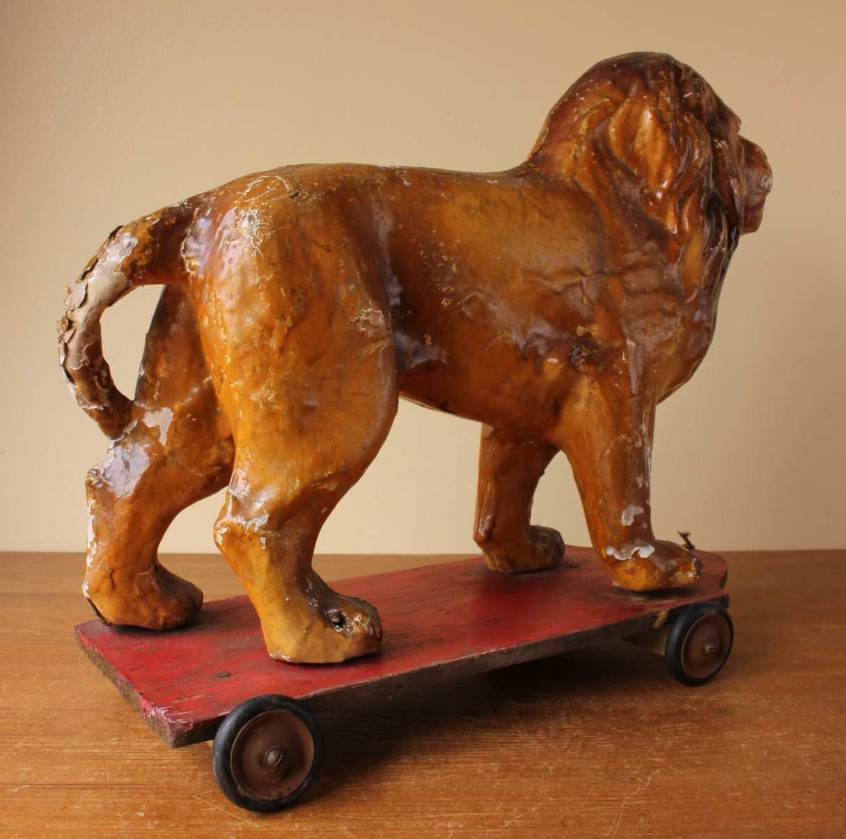 French Pull Along Lion. Paper Mache Model Animal Decorative Toy Trolley. photo vintage