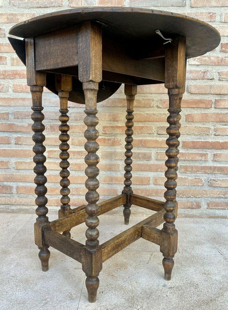 Round Folding Center Oak Table With Carved Top And Solomonic Legs, 1940s photo vintage