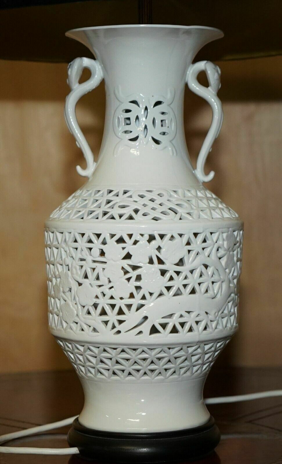 Lighting Vintage White Porcelain Chinese Style Lamp With Ornately Pierced Body photo