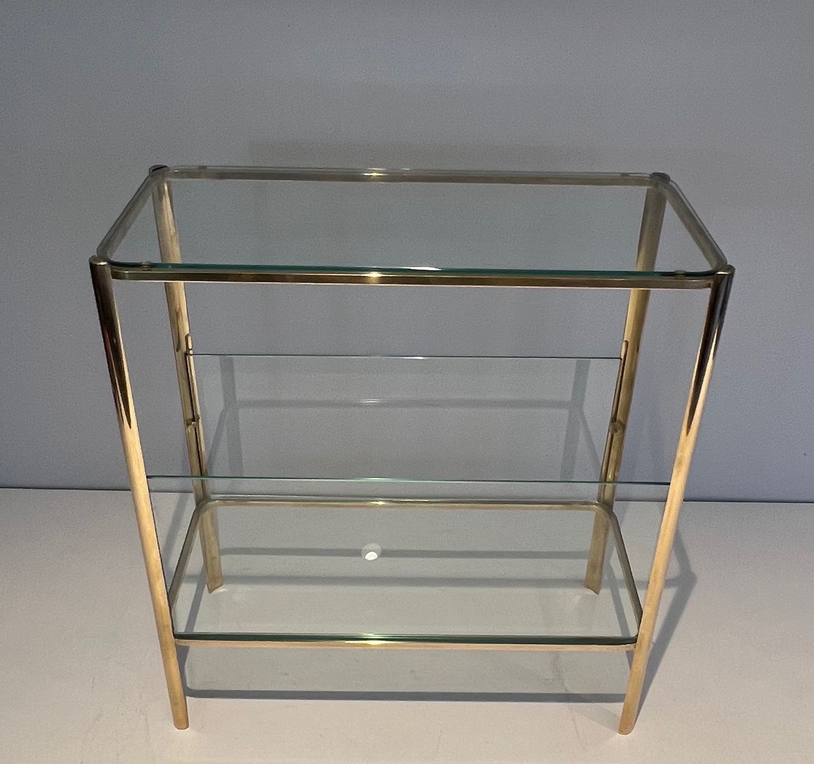 Magazine Rack In Polished Bronze And Glass Signed Jacques Théophile Lepelletier And Stamped Broncz photo for sale