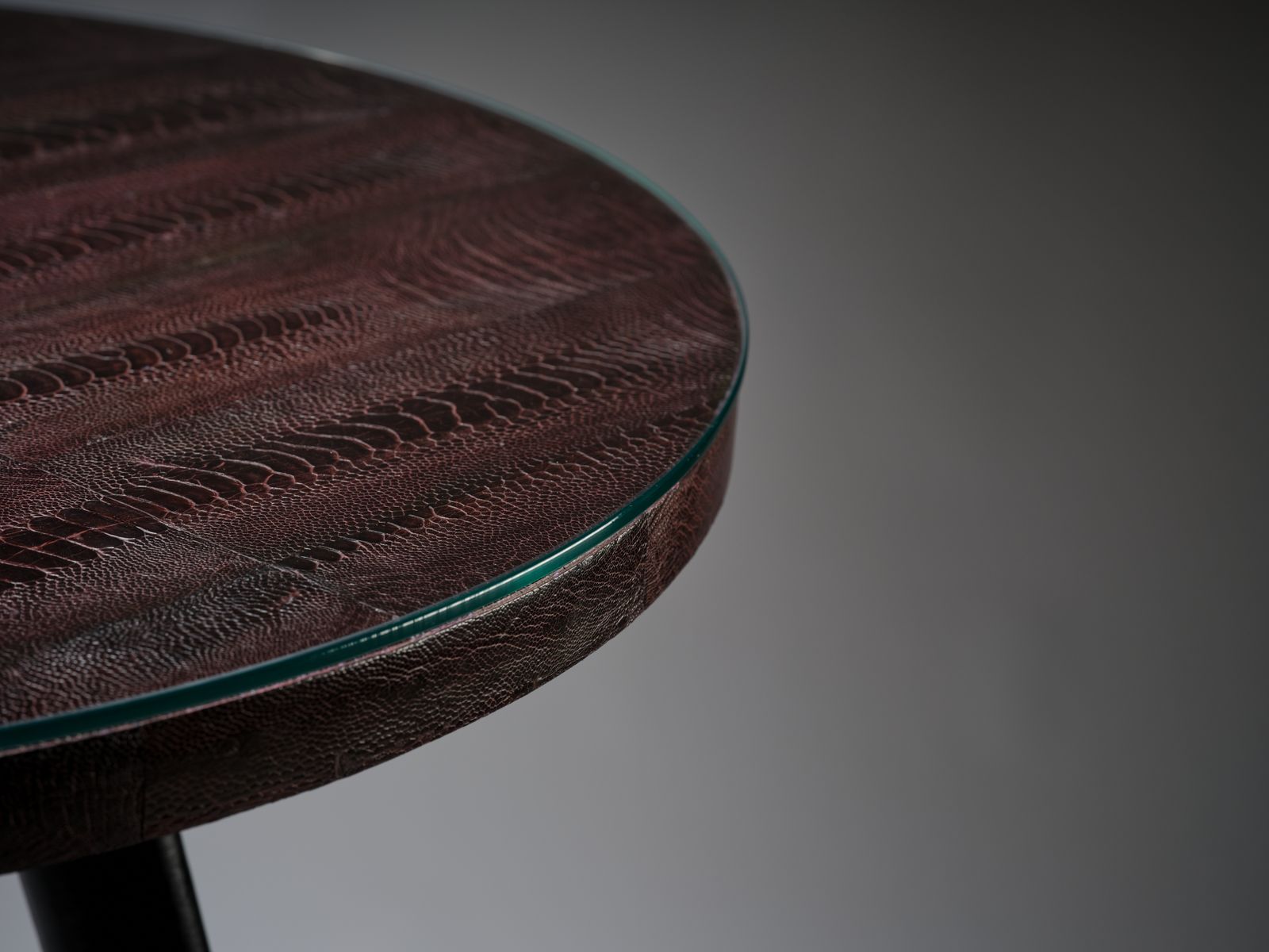 Furniture Unique And Rare Aubergine Hand Dyed Boa Constrictor Snakeskin Table Resting On Black Hand Laced Leather Legs, South Africa Circa 1980's. photo