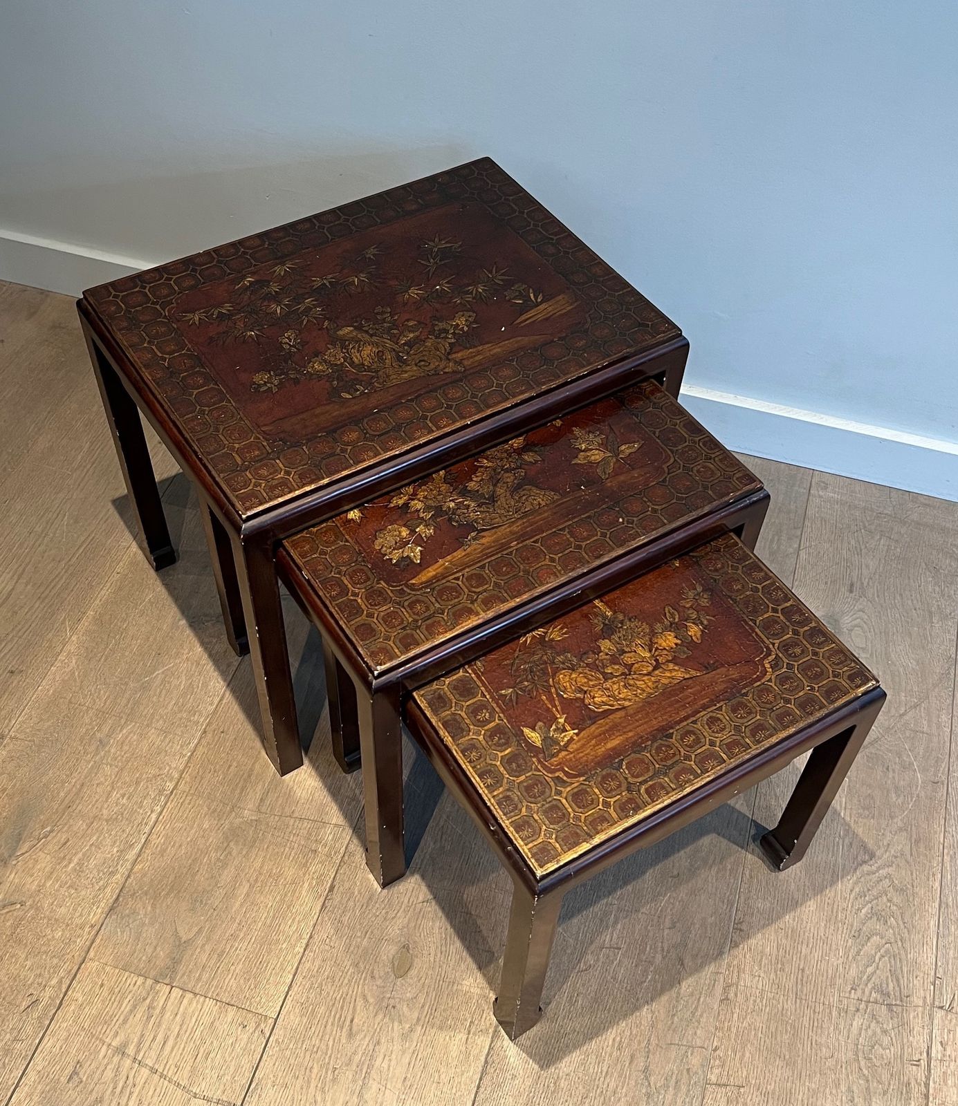 Suite Of Three Lacquered Nesting Tables With Chinese Decors. Around 1940