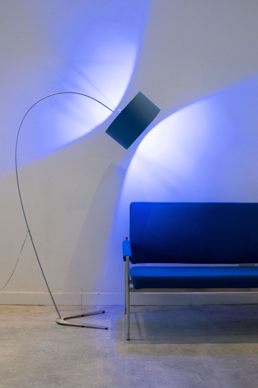 Standard Lamp With Blue Shade With Green Interior Over Arched Shaft To A U Shape photo furniture