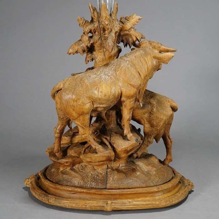 photo furniture Large Group Of Carved Cattles With Glass Vase Inset, Brienz Ca. 1890